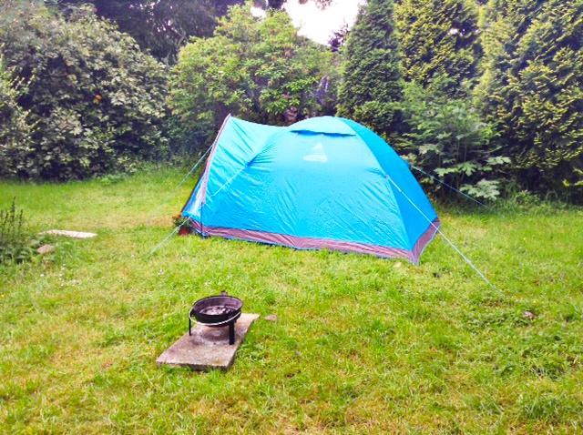 grass pitch with a tent and a barbecue in south-west part of the garden